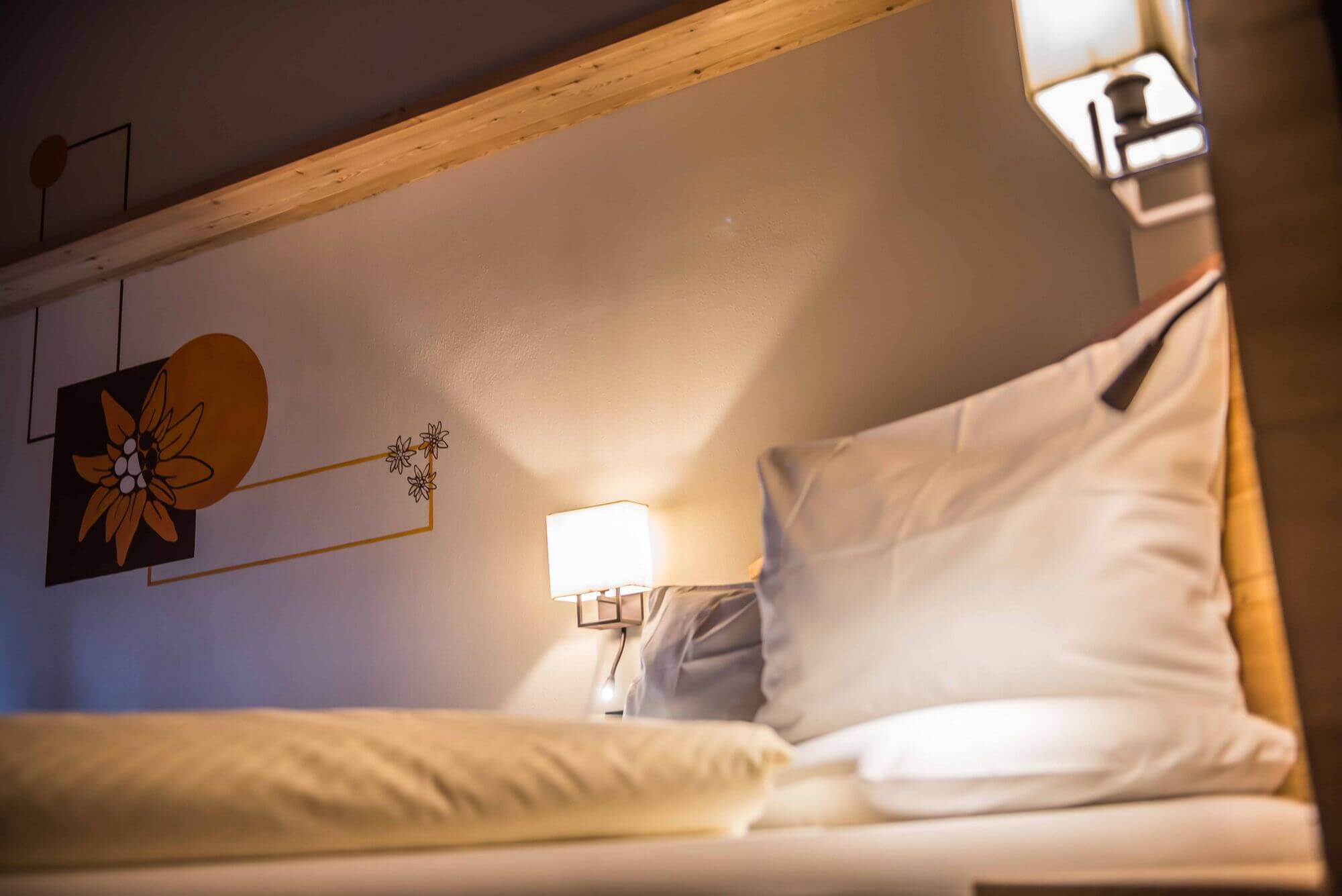 Dettaglio del letto della Suite: Hotel Le Alpi a Livigno